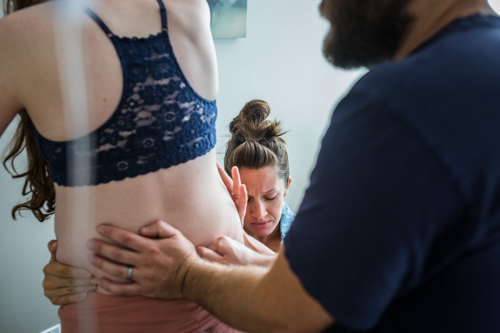 A doula supporting a family at a birth center